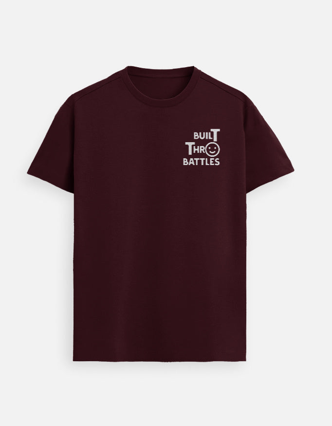 “Built Thro Battles Unisex FeatherLite T-Shirt in Maroon – 160 GSM Supima Cotton Christian apparel inspiring resilience, crafted in India by StyleYourFaith.”